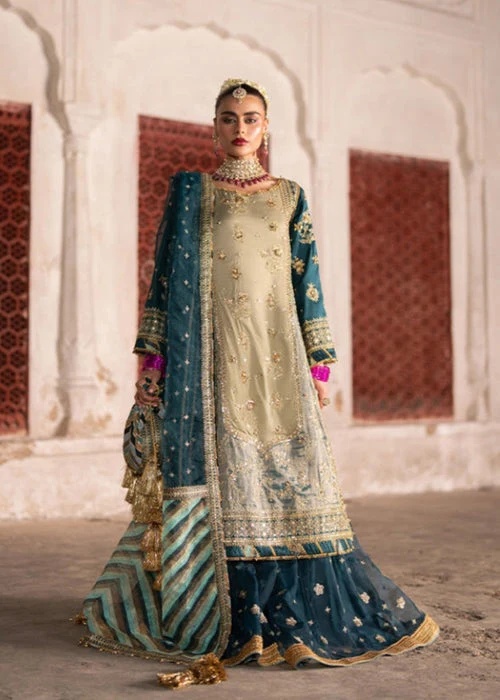 Mohsin Naveed Ranjha pakistani fashion outfit with coordinated formal styling.